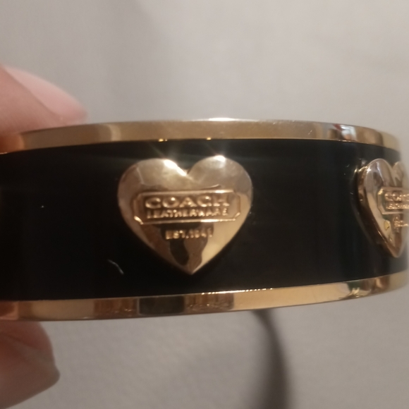 Coach Jewelry - COACH Heart bracelet. Gold and black tone. Size 8
